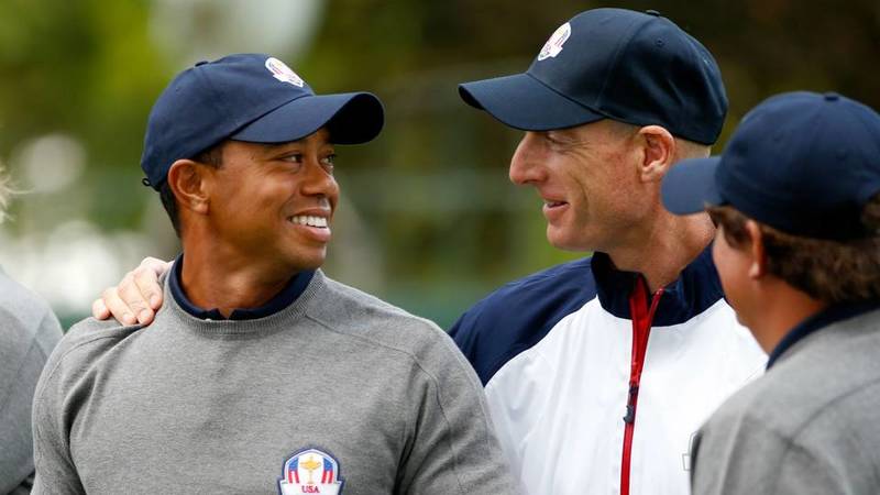 Tiger Woods with Jim Furyk