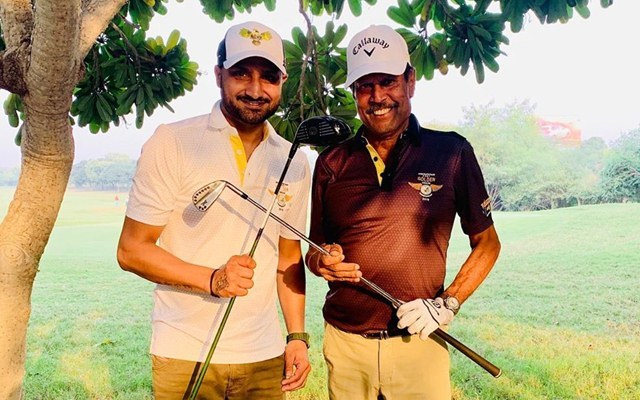 Harbhajan singh playing golf with Kapil Dev