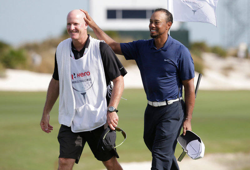 tiger woods with his caddie
