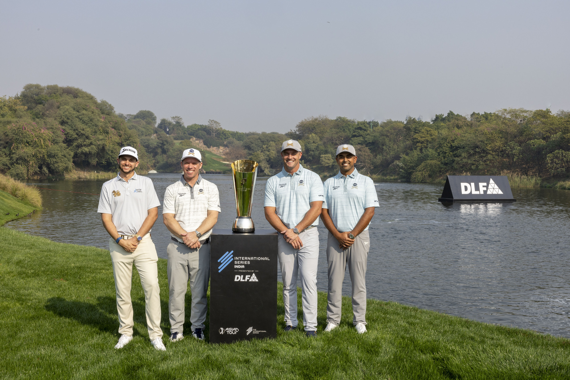 (L to R), John Catlin of USA, Paul Casey of England, Bryson Dechambeau of USA and, Anirban Lahiri of India pose with the trophy. Credit- Ian Walton/Asian Tour.