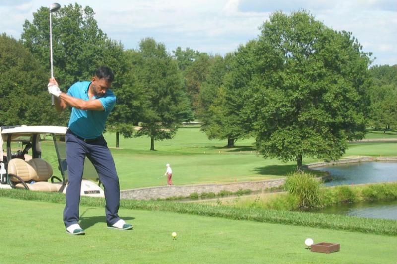 ms dhoni playing golf